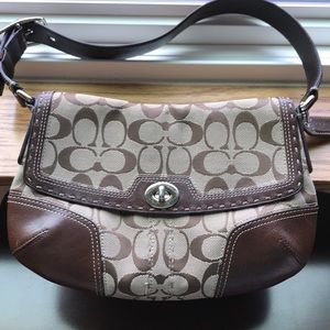 Coach signature brown purse with leather accents